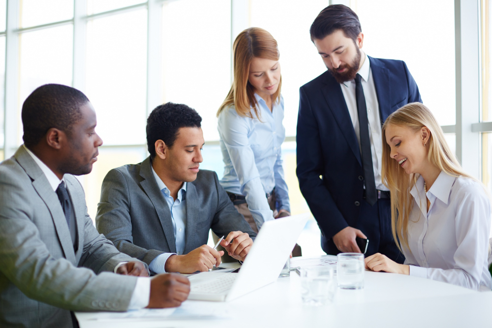 Creative agency coworkers discussing new project
